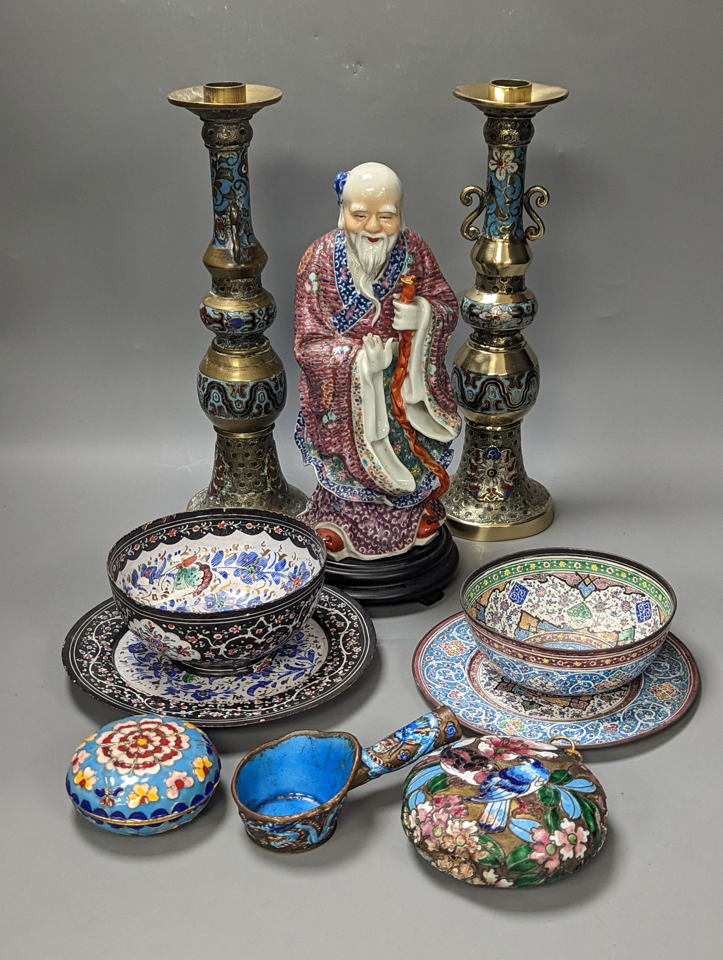 A Chinese porcelain figure of Shao Lao, a pair of Japanese bronze and champleve enamel candlesticks, Persian enamel wares etc